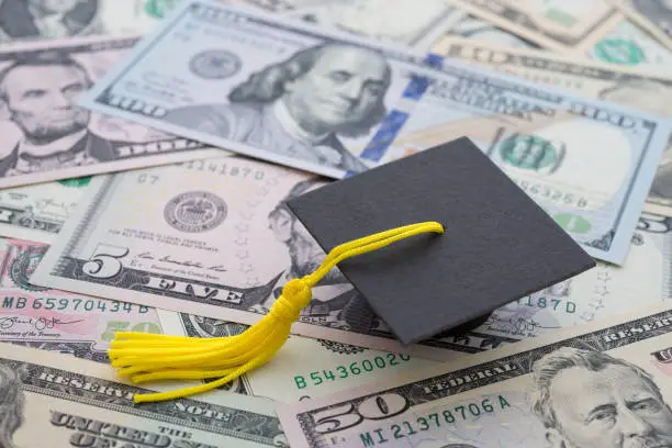 How Is a Student Loan Different from a Scholarship?